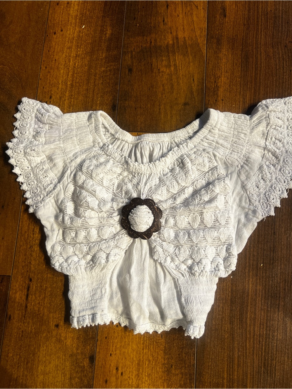 White Crochet-Detail Top with Floral Buckle